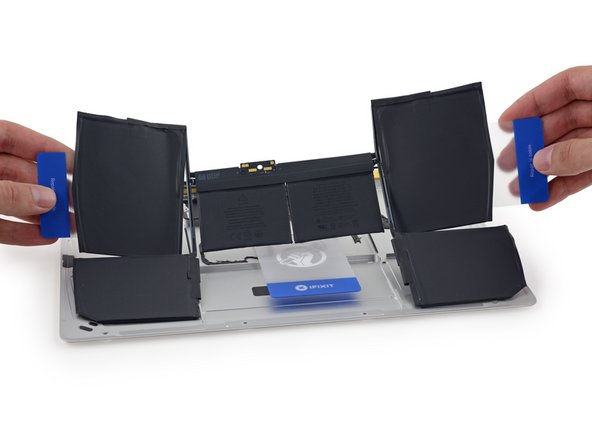 Image 2/2: Apple says that they use photos from high-speed cameras to help align these batteries in their cases, [http://www.apple.com/macbook/design/|accounting for variations at the microscopic level|new_window=true].