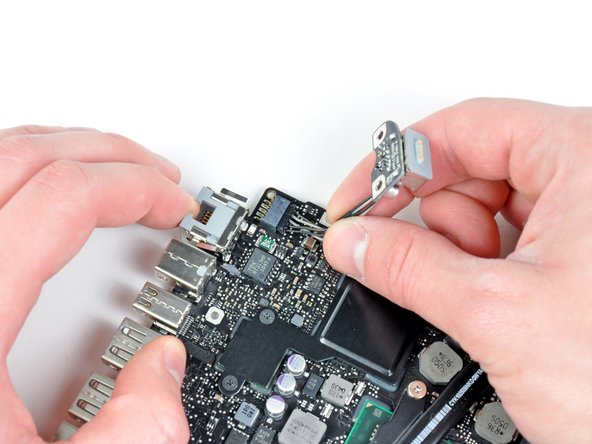 Image 1/1: Remove the DC-in board.