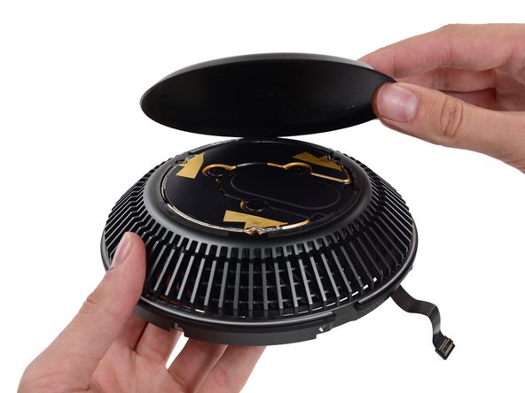 Image 1/3: Snug in a nest of antennas, the AirPort card fits onto a small adapter board that also connects to the fan below.