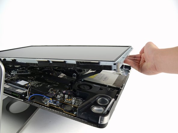 Lift and remove the display panel from the device.