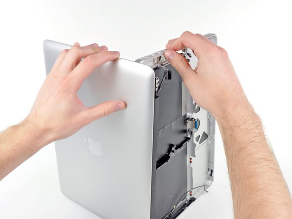 Image 1/3: Rotate the display slightly away from the upper case.