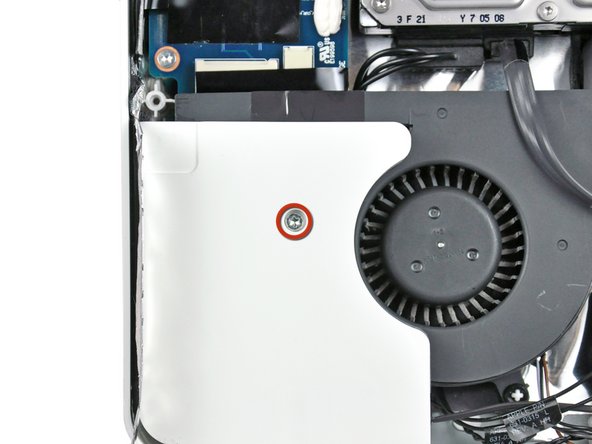 Image 1/2: Pull the left speaker out of the rear case.