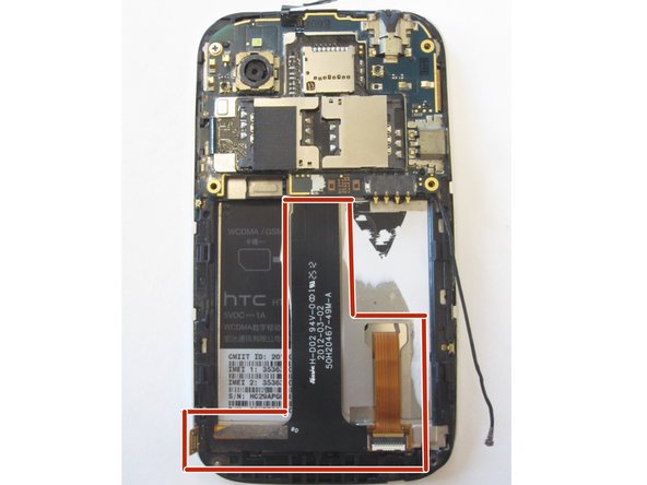 You should now see a black ribbon cable, which was connected at the left to the Nav board, and on the right, to a gold ribbon cable which goes to the screen.