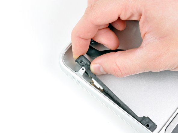 Image 1/2: Remove the hard drive cable.