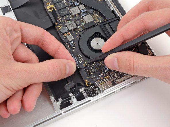 Image 1/3: Be sure you are prying up on the hinged retaining flap, '''not''' the socket itself.