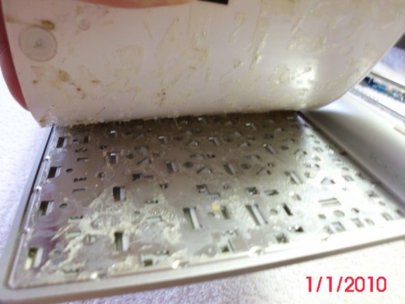 Image 3/3: Glue is all over the bottom plate.  It was separated by pulling it apart and slicing the glue with a scalpel.
