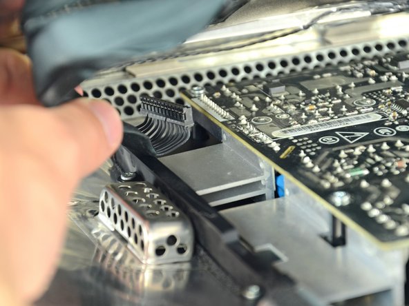 Be very careful not to touch the exposed face of the power supply to avoid electric shock from the many large capacitors attached to the other side of the board.