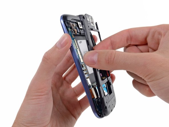 Image 2/2: The midframe lightly snaps in place, and can be removed with very little force.