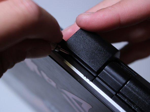 Work your way around the back corners of the computer as well.