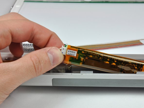 Image 1/1: Carefully lift the inverter board out of the clutch cover.