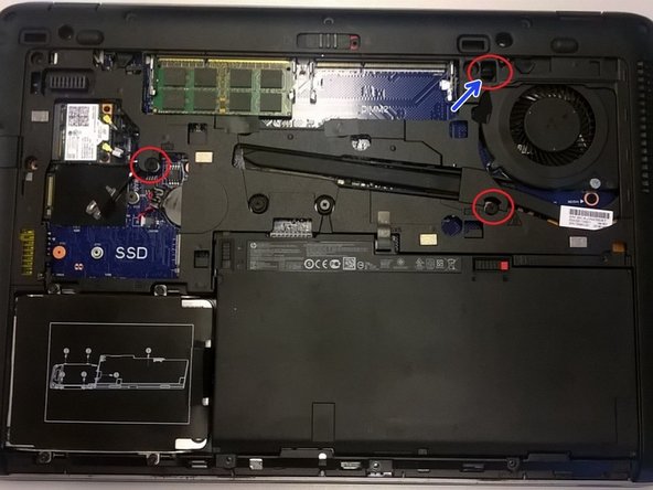 Image 1/1: There is a gap next to the unit's fan (circled in red) large enough for a screwdriver to pop the keyboard loose. Simply push down.