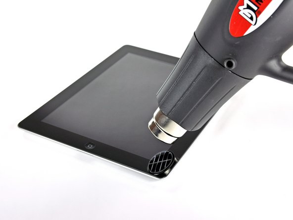 Image 1/2: Unlike the original [guide|2183|iPad|stepid=11068], it looks like we need the help of a handy dandy [product|IF145-031|heat gun] to remove the front panel.