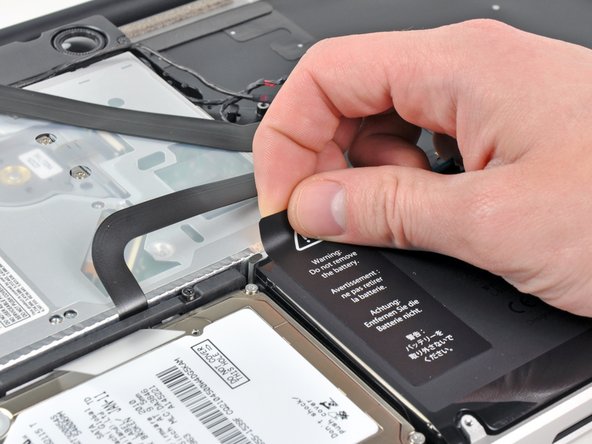 Image 1/1: Do not remove the label from the battery.