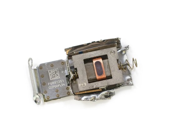 Image 3/3: It makes sense that the Taptic Engine is attached to the speaker. When combined with subtle audio cues from the specially engineered speaker driver, the Taptic Engine is designed to output a unique motion.