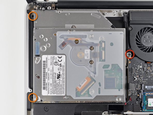 Image 1/1: One 4.5 mm Phillips screw securing the optical drive bracket to the upper case near the fan.