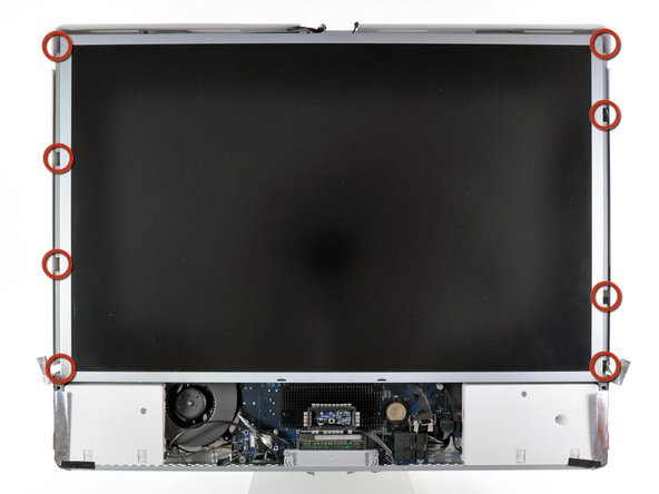 Image 1/1: Remove the eight T8 Torx screws securing the display assembly to the rear case.