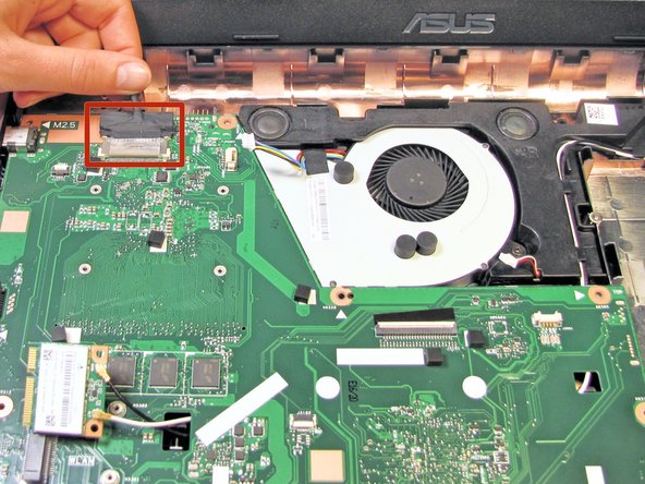 Remove the LCD display connection by gently pulling on the attached wire.