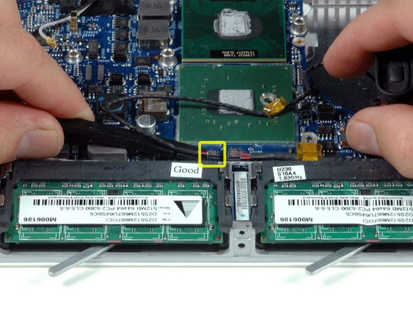 Image 1/1: Lift the left speaker out of the computer.