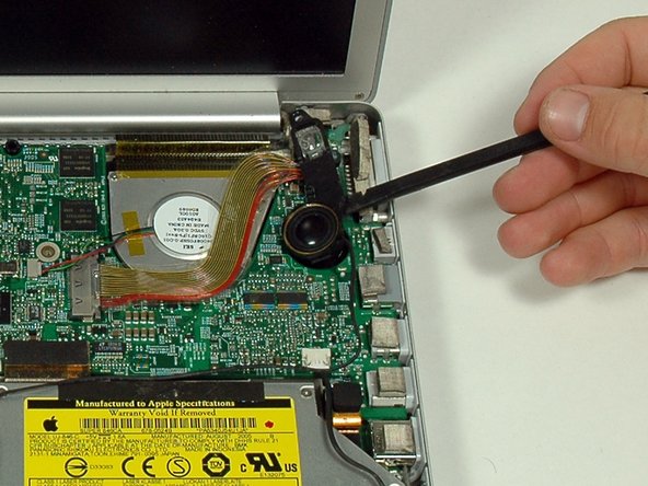 Image 1/1: The right ambient light sensor cover is connected to the speaker and should not be removed.