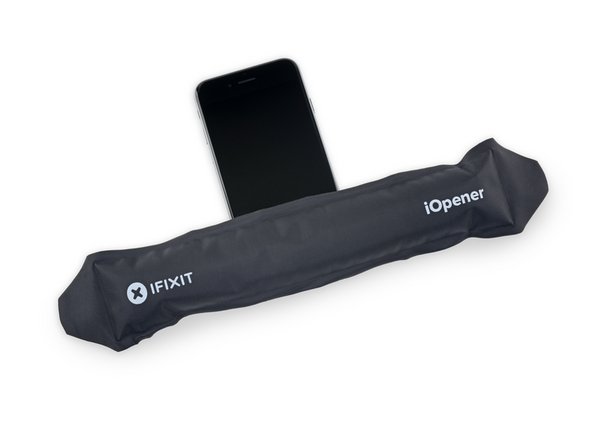 Optionally, apply mild heat to the lower edge of the iPhone using an iOpener or hair dryer for about a minute.