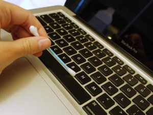 how to fix sticky space bar macbook