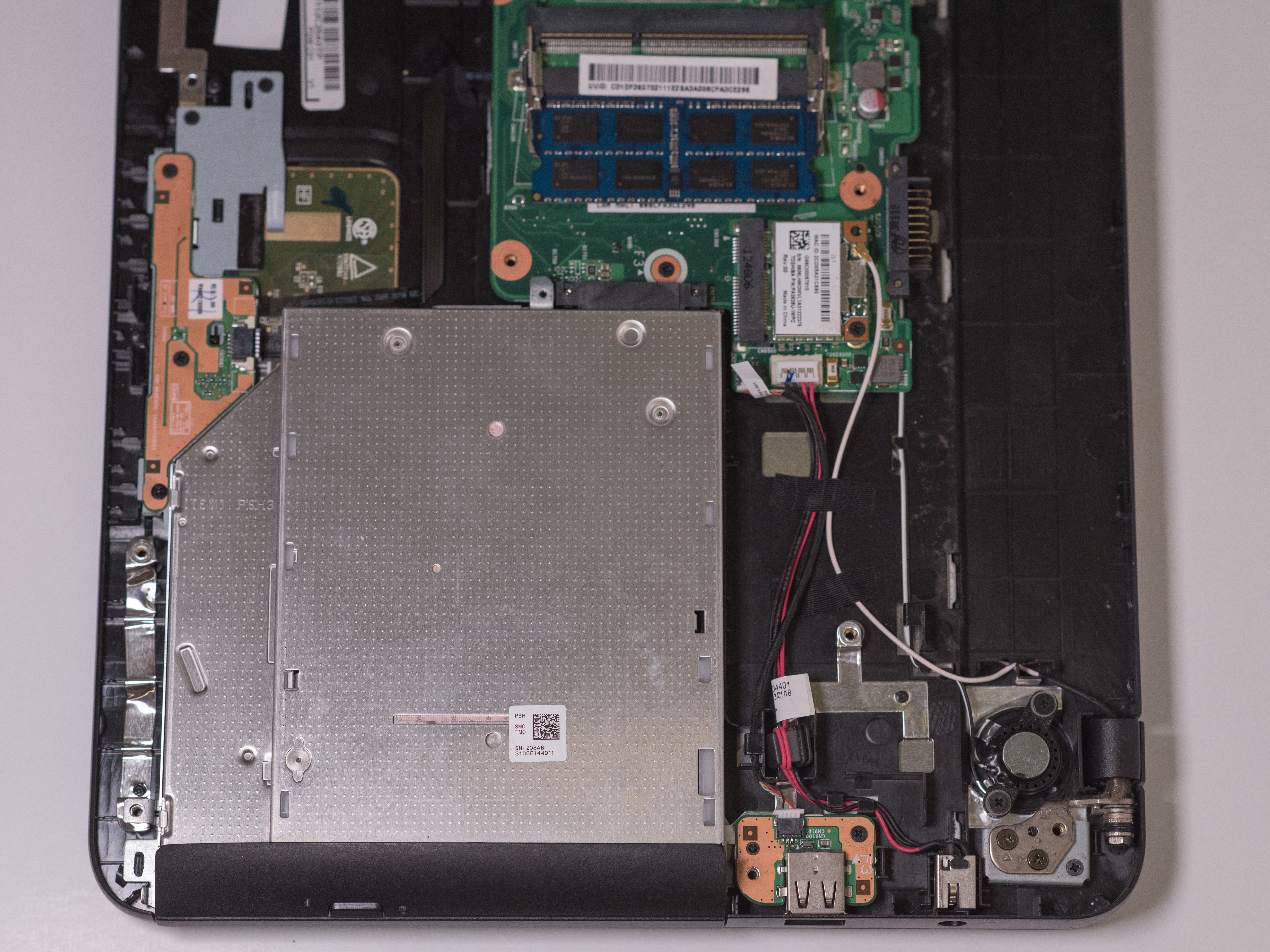 Toshiba Satellite C855S5115 DVD Tray Replacement iFixit Repair Guide