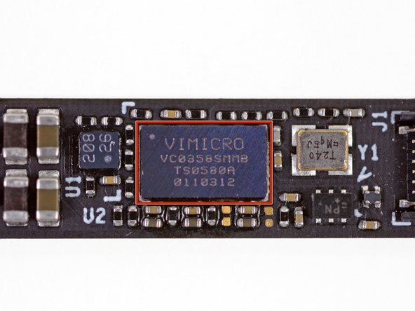 Image 2/3: The camera interfaces with the rest of the computer via the [http://www.vimicro.com.cn/product/pdf/Vimicro_VC0358_PB_V1.0.pdf|Vimicro VC0358] USB camera interface IC.