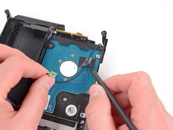 Image 1/1: You'll want to transfer this thermal sensor to the same position on your new hard drive.