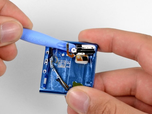 The glue is gone, and the last of our plastic opening tool duties are done.