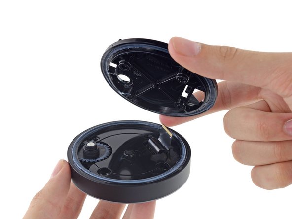 Image 2/3: The volume dial contains the user-interactive bits: the top portion spins freely, using a greased-up gear to turn an encoder...