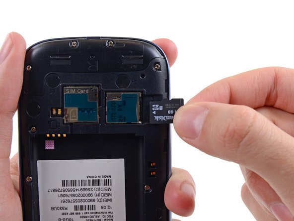 Image 2/2: Remove the microSD card from the phone.