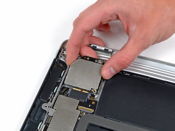 Removing the communications board in the Apple iPad 3G teardown