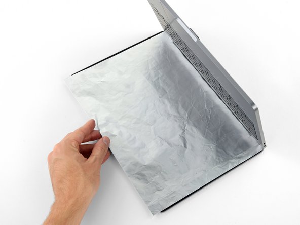 The liquid adhesive remover provided in your iFixit battery replacement kit can affect the antireflective coating on your MacBook Pro's display.