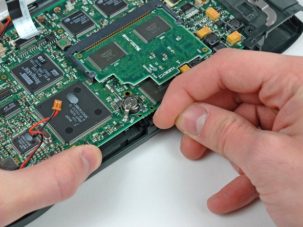 Removing the logic board from the Apple Tablet during the teardown