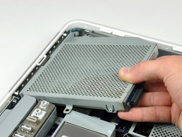 Image 3/3: Lift the optical drive out of your iMac.