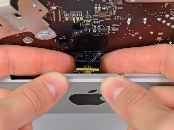 Image 1/1: Remove the IR sensor and set it aside.