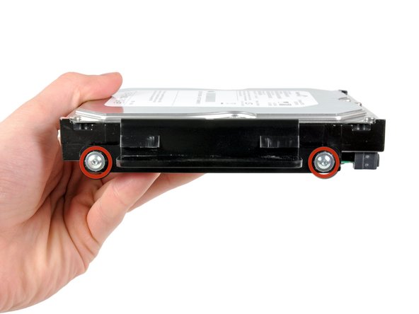 Image 1/1: Remove the hard drive bracket.