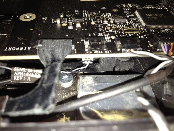 Image 2/2: Remove the single screw there holding it in place