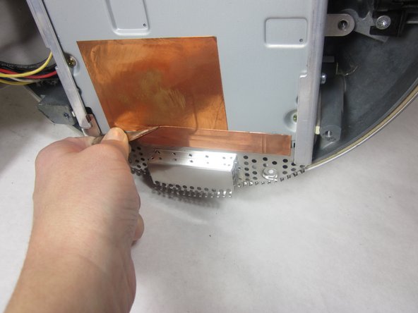 Image 3/3: Carefully remove shield and copper tape