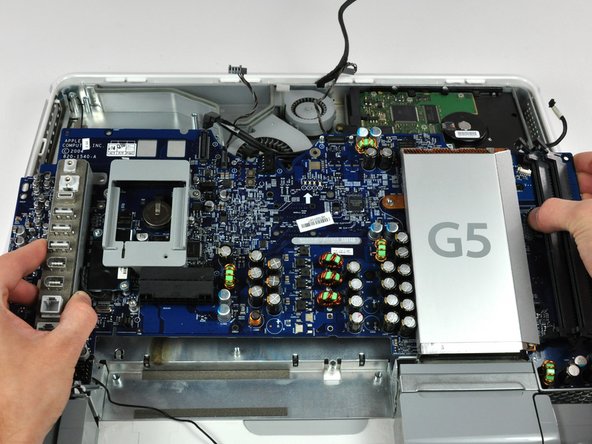 Image 1/2: When reinstalling your logic board, be sure to clean and apply a new layer of thermal paste to the U3 chip (highlighted in red) located on the underside of your logic board as well as its copper heat sink attached to the midplane.