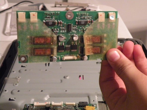 Image 3/3: Remove these 3 phillips screws.