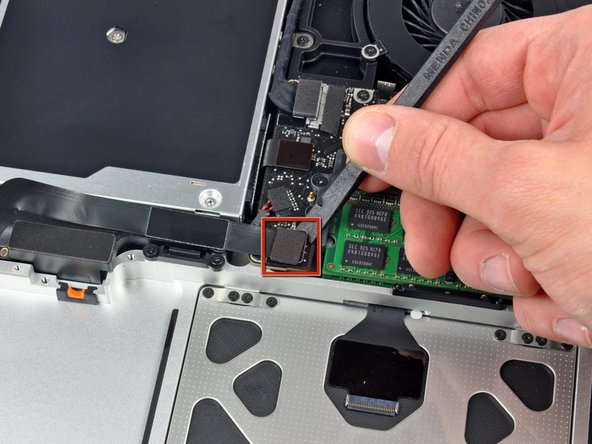 Image 1/1: Lift the hard drive and IR sensor assembly out of the upper case.