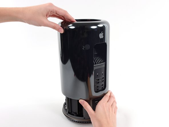 Image 3/3: It may help to push down on the center of the fan while lifting the case up.