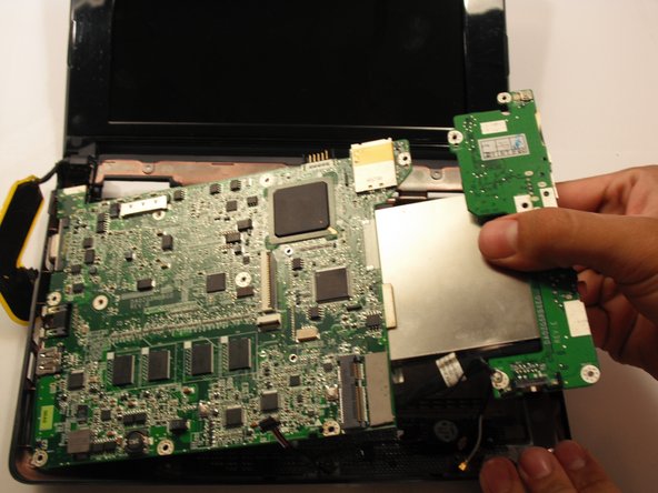 Lift the entire motherboard assembly out the case.