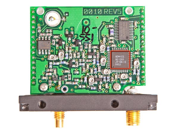 Image 1/2: The larger of the two boards contains the connections for both antennas and is responsible for the RF side of the tracking device. Its notable chips include: