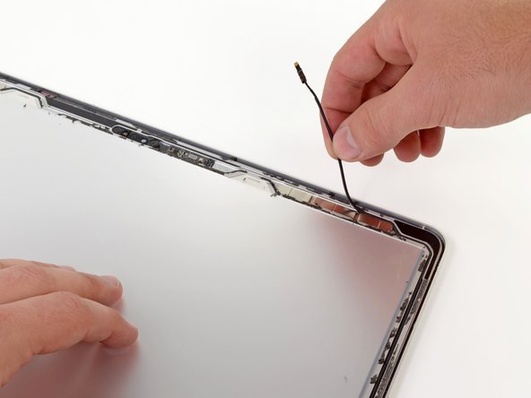 Image 1/2: The camera cable is routed along the outside edge of the display assembly, making replacement very difficult and costly. Thankfully the cameras fail very infrequently, if at all.