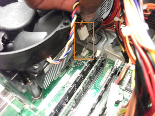 Image 1/1: Remove the fan's power cable from the motherboard.
