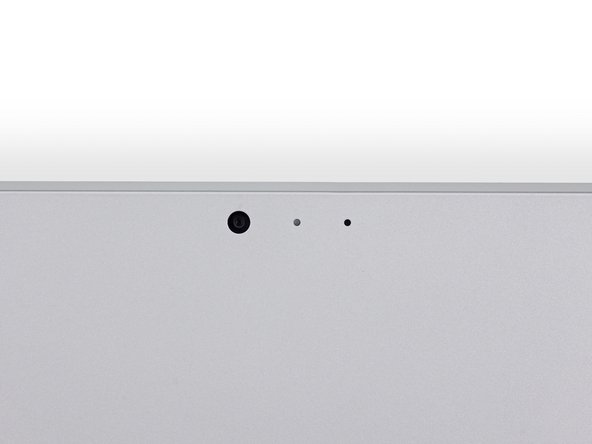 Image 1/3: Arrayed across the back, we find the  rear-facing camera, accompanied by two additional specks—a status LED and a microphone.