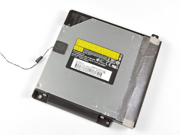 Image 2/3: The area shaded in red in the third picture is presumably where the [link|http://store.apple.com/us/configure/MC812LL/A?mco=MjIwNTQ2NTA#hardware|optional SSD] is housed. The three mounting points within the shaded area have nothing attached to them in our machine, since this option is only available on 2.7 GHz 21.5" iMacs.