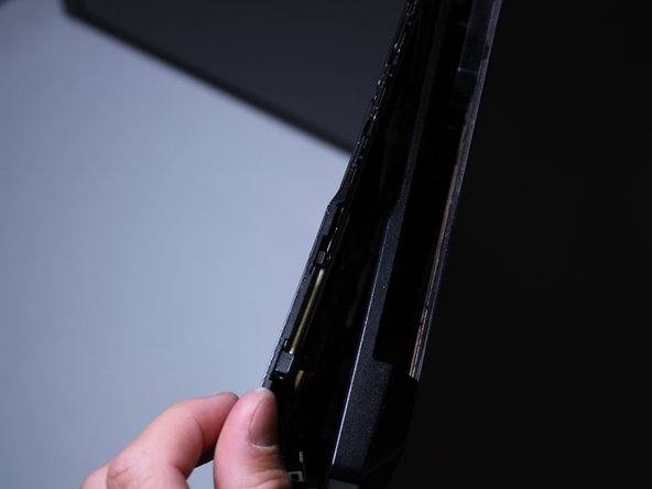 This is easiest to get to by closing the computer shut.